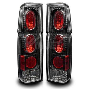Winjet 86-97 Nissan Hardbody Altezza Tail Light Black/Clear WJ20004104
